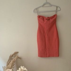 Orange strapless Herve Leger dress